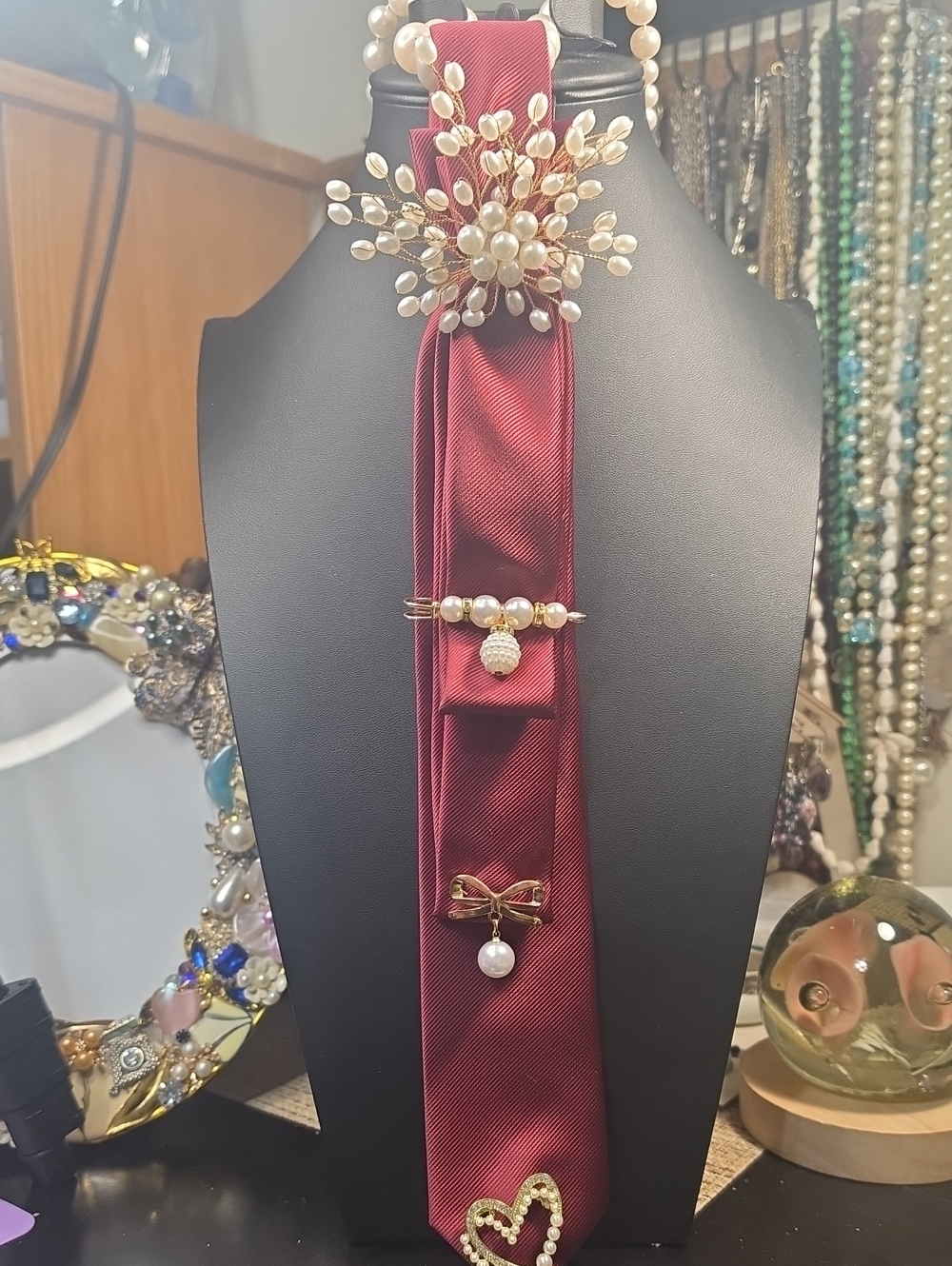Pearl-Embellished Burgundy Necktie And Faux Pearl Necklace